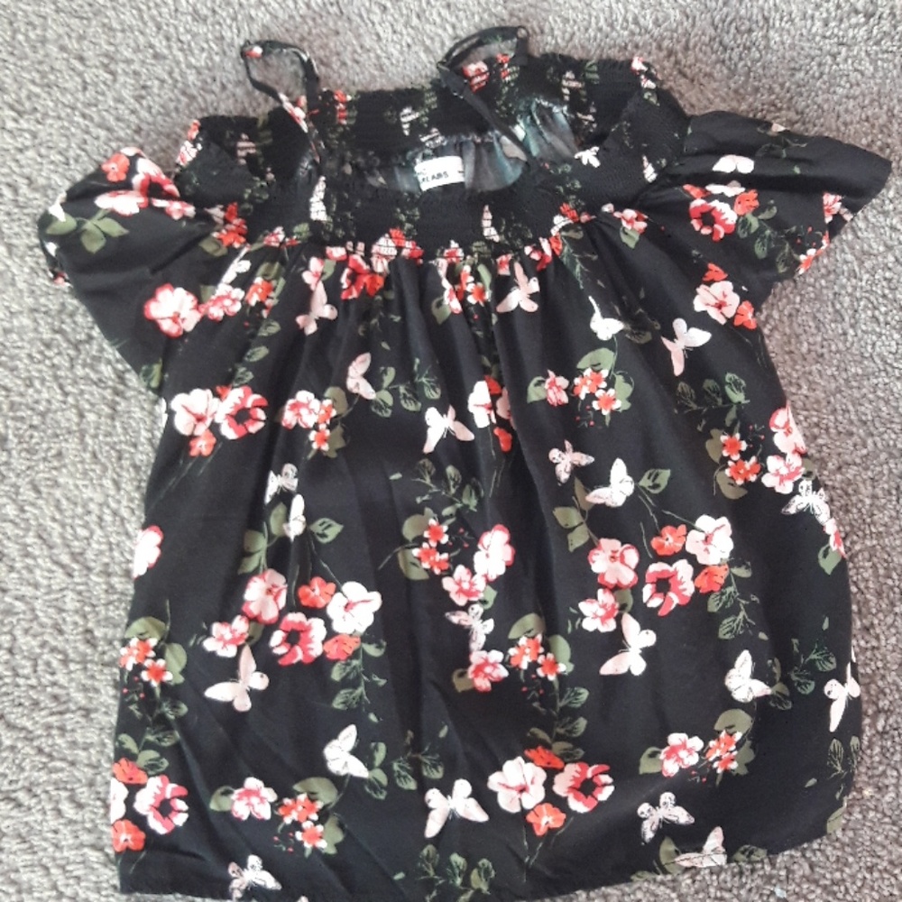 Epic threads off the shoulder shirt.